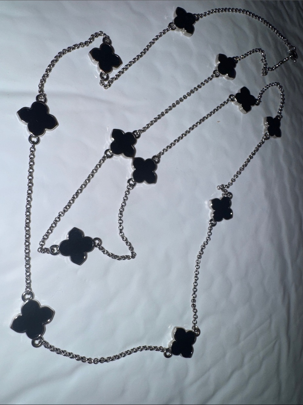 Silver-Tone Long Station Necklace with Black Clover Accents